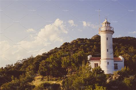 Lighthouse On The Hill Architecture Stock Photos Creative Market