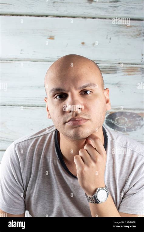 Attractive Young Man Shaved Head Hi Res Stock Photography And Images