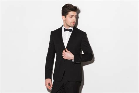 Premium Photo Portrait Of A Handsome Young Man Wearing Black Suit