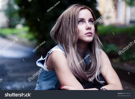 Beautiful Young Girl Sitting Sadly Stock Photo 92779615 Shutterstock