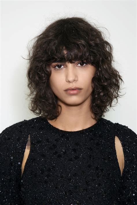 Similar to the curly fringe hairstyle a few cuts back, this look may require a little more hair gel. Yes, Curly Bangs Are Back—Here's How to Pull Them Off | StyleCaster