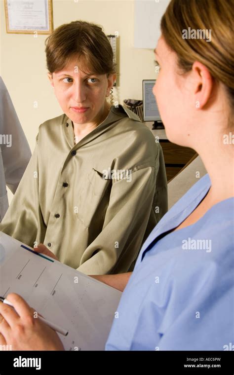 Nurse Talks With Female Patient Before Exam Stock Photo Alamy