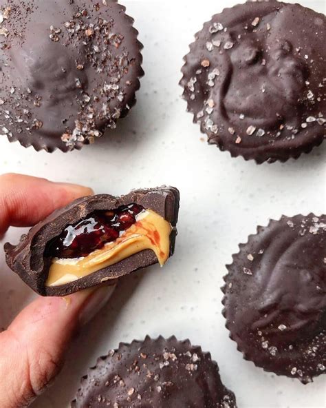 4 Ingredient Chocolate Peanut Butter And Jelly Cups Nourish And Tempt