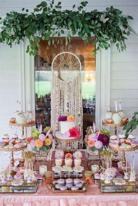 take a look at this pretty boho dreamcatcher 1st birthday party the dessert table is stunning
