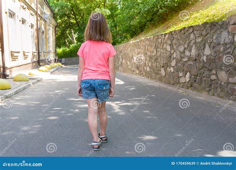 Rear View One Little Caucasian Girl Walking Away Lifestyle Stock