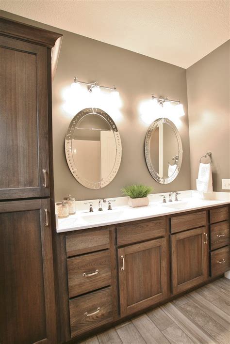 The rustic kitchen cabinet style is also not that different from the country kitchen style as both exude warmth, comfort and natural coziness. Hickory cabinets with "Stone" stain applied in a home ...