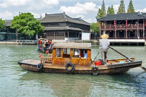 Chinese Traditional Rowboat In The Dianpu River In Zhujiajiao Ancient