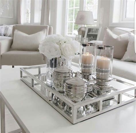 Coffee table decoration with refined candle sconces, scented candles or creative arrangements that include house plants, sea shells, driftwood pieces, books or other small decorations, offers spectacular displays for unique and modern interior decorating. Pin on Living room