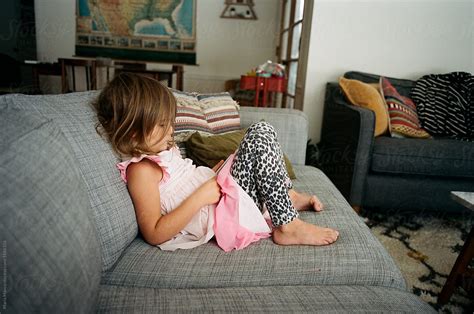 Babe Girl Relaxing At Home By Stocksy Contributor Maria Manco