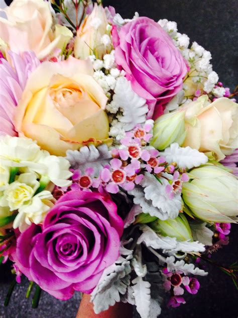 Bridal Bouquet Of Wax Flower Roses And Blushing Bride Flowers