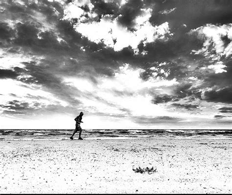 Runner On The Beach Jurmala Photograph By Aleksandrs Drozdovs