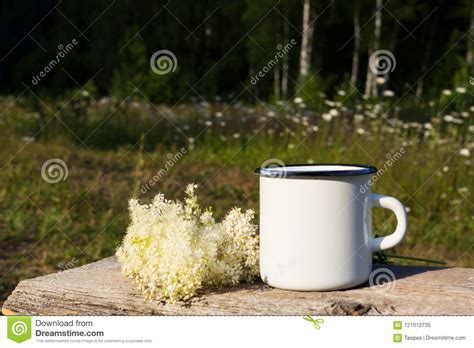 Download White Campfire Enamel Mug Mockup With White Flowers Stock ...