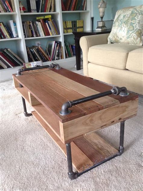 I was going to put dowels in the empty spaces, but hubby said he would cut me some thin pieces of wood on the table. Handmade Industrial Pallet Coffee Table | Pallet Furniture ...