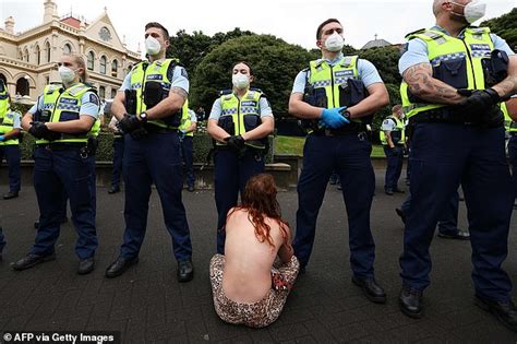 Dramatic Moment Police Are Seen Dragging A Naked Woman By Her HAIR Along The Ground During