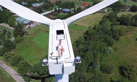 San Diego Sunbather On Top Of Wind Turbine Is Surprised By Drone