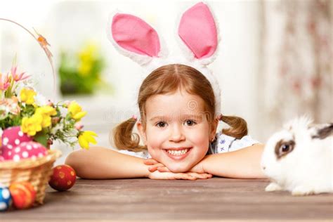 Happy Easter Happy Funny Child Girl Playing With Bunny Stock Photo