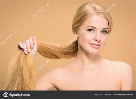Attractive Naked Woman Holding Long Blond Hair Smiling Camera Isolated