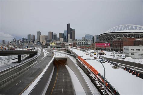 As Snow Turns To Rain Flood Warning Issued In Seattle And Other Urban
