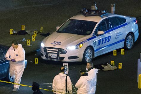following shooting deaths in brooklyn law enforcement community pays tribute to slain nypd