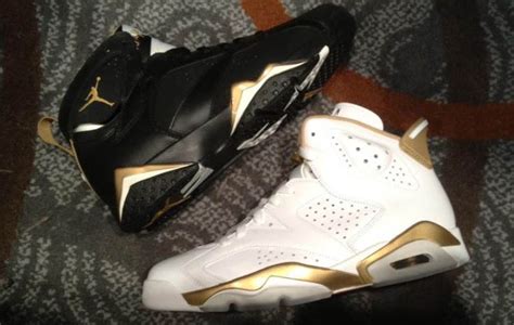 A Pair Of White And Gold Air Jordans