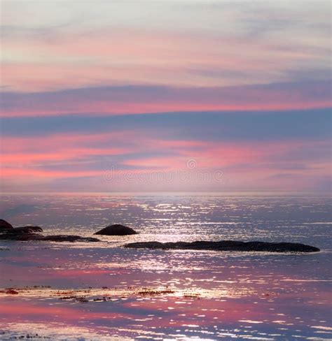 Pink And Blue Sky Reflecting In Water Soft Seascape Stock Image Image