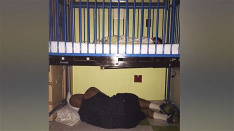 Father Falls Asleep Under Sick Sons Crib At The Hospital