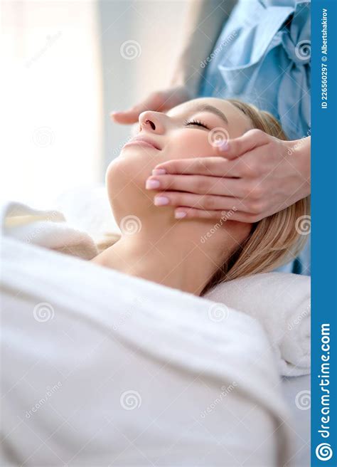Woman Doing Relaxing Face Massage In Salon Classic Massage For Purpose Prevention Stock Image