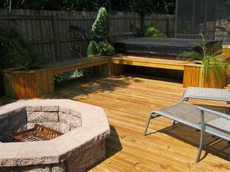 There are several factors to consider when using fire pits and fireplaces in conjunction with trex decking. Fire pit built into wood deck | Deck design and Ideas