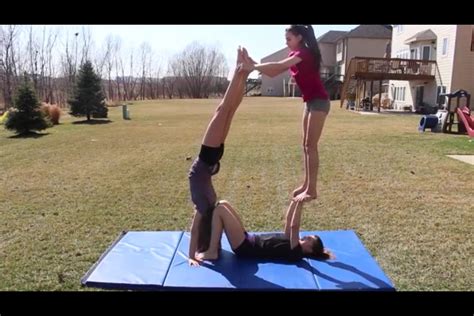 3 Person Acro Stunt Acro Yoga Poses Yoga Challenge Poses Cheer Poses