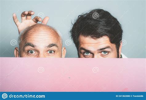 Bold Senior Man Bald Head Portrait Of A Men Combing Himself Hair