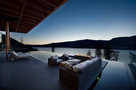 Stunning Lakeside Home Blends Infinity Pool With Lake And Sky