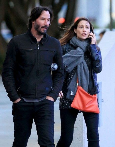 Keanu Reeves Photos Photos Keanu Reeves And A Mystery Woman