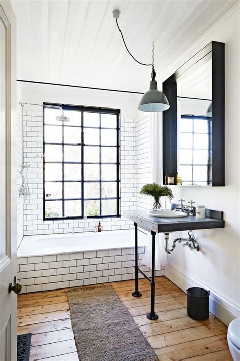 Subway tiles are beloved for their timelessness, so keep things classic with a white repeating bond pattern. 33 Chic Subway Tiles Ideas For Bathrooms - DigsDigs