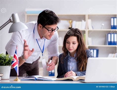 Teacher Explaining To Student At Language Training Stock Image Image