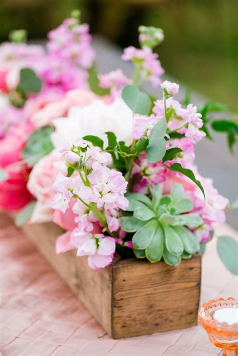 Create your own beautiful, affordable diy flower arrangements this spring using what's blooming in your own yard. Peony and Succulent Wood Flower Box Centerpieces