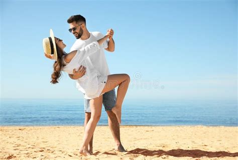 Happy Couple Dancing On Beach Near Sea Honeymoon Trip Stock Image Image Of Married Beautiful