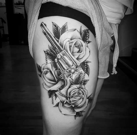 Guns And Roses Thigh Tattoo