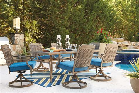 Partanna Bluebeige Dining Set With 6 Swivel Chairs Ez Furniture
