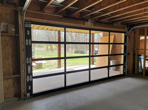 Full View Glass Basement Garage Door Installed In Winder Ga