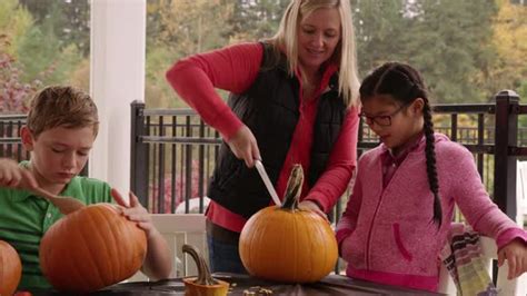 Mom And Kids Carving Pumpkins For Halloween Stock Footage Videohive
