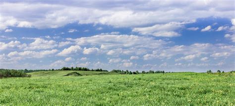 Rural Landscape In Farm Areas With Cumulunimbus Clouds Forming Rain In