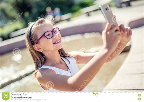 Selfie Beautiful Cute Young Girl With Braces And Glasses Laughing For