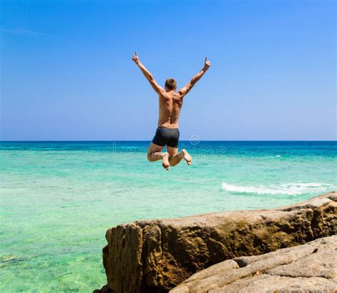 Man Jumping In The Sea Royalty Free Stock Photography Image