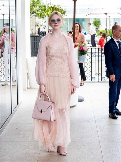 Elle Fanning In A Pink Dress Leaves The Martinez Hotel In Cannes Celebsla Com