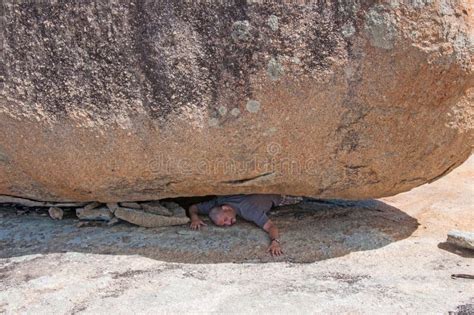 Man Crushed Under Rock Stock Photo Image Of Natural 49435784