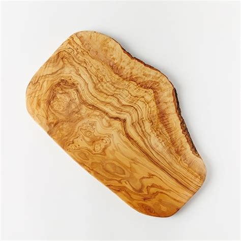 Rustic olive wood cheese/chopping board. Olive Wood Rustic Cutting Board | west elm