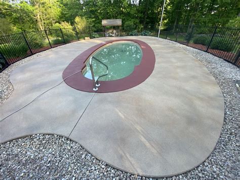 Stamped Concrete Pool Deck With Buff Color Spray Texture Earthtone
