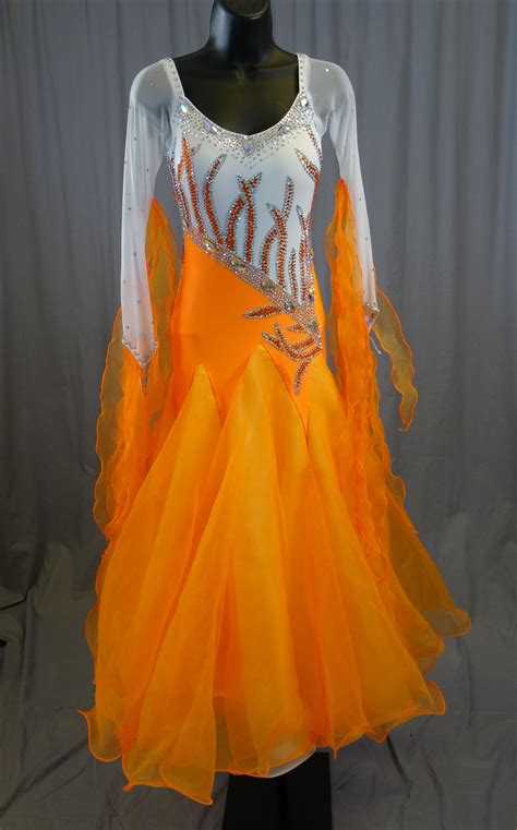 Orange ballroom dress full of stones. Elegant White and Orange Ballroom Dress