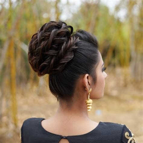 Besides delivering a look of elegance plus allowing you to wear your hair a low bun is the most classic bridal hairstyle of all time. Trending Bun Hairstyles for your Wedding Reception - K4 Fashion