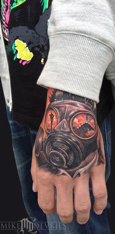 18 Dark And Mysterious Gas Mask Tattoos Gas Mask Tattoo Hand Tattoos